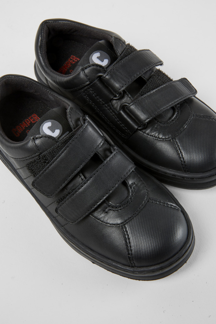 Close-up view of Runner Black leather and textile sneakers