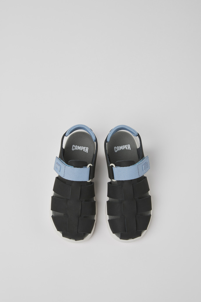 Overhead view of Oruga Black leather sandals for kids