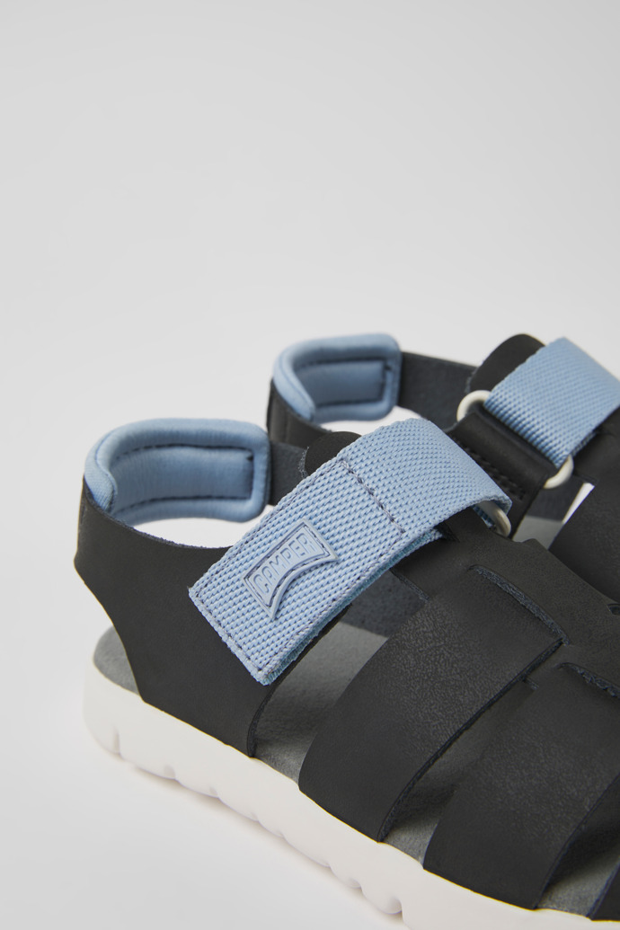 Close-up view of Oruga Black leather sandals for kids