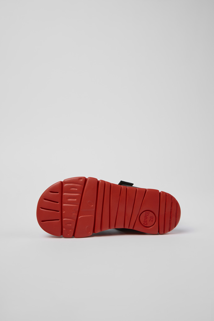The soles of Oruga Black Leather/Textile Sandal