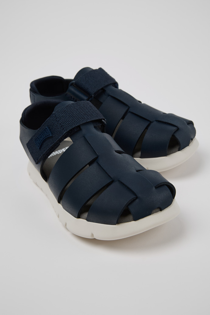 Close-up view of Oruga Blue Leather and Textile Sandals for Kids.