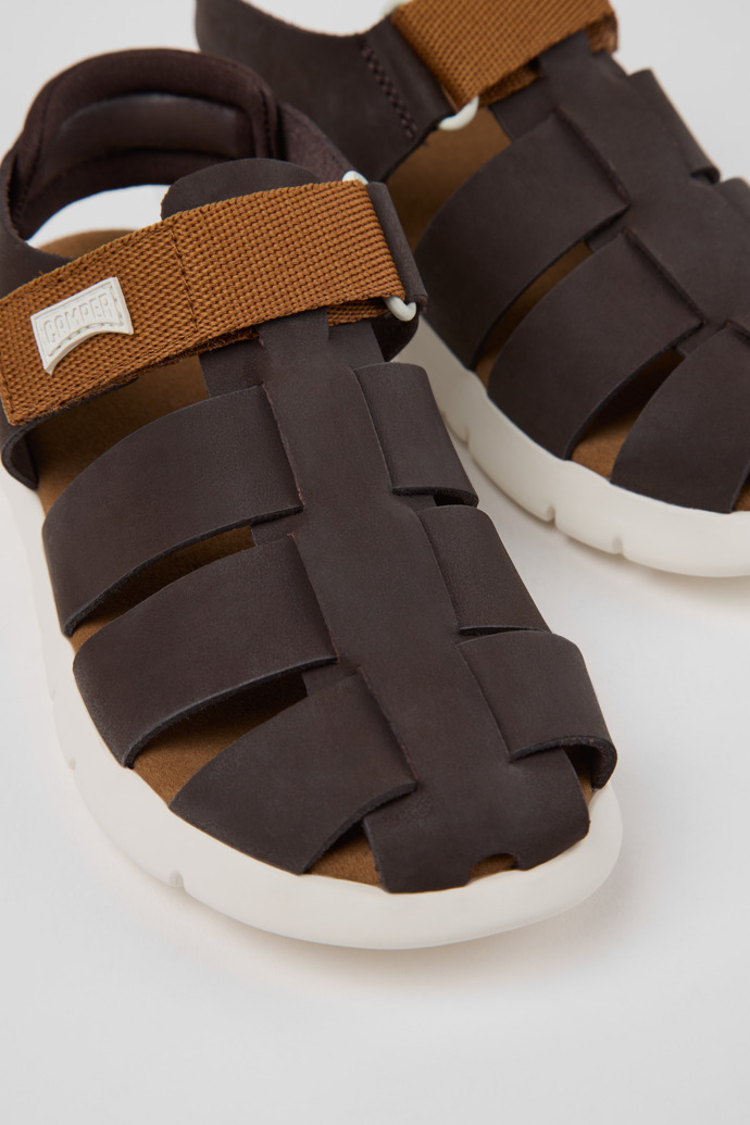 Close-up view of Oruga Brown Leather and Textile Closed Sandals for kids.