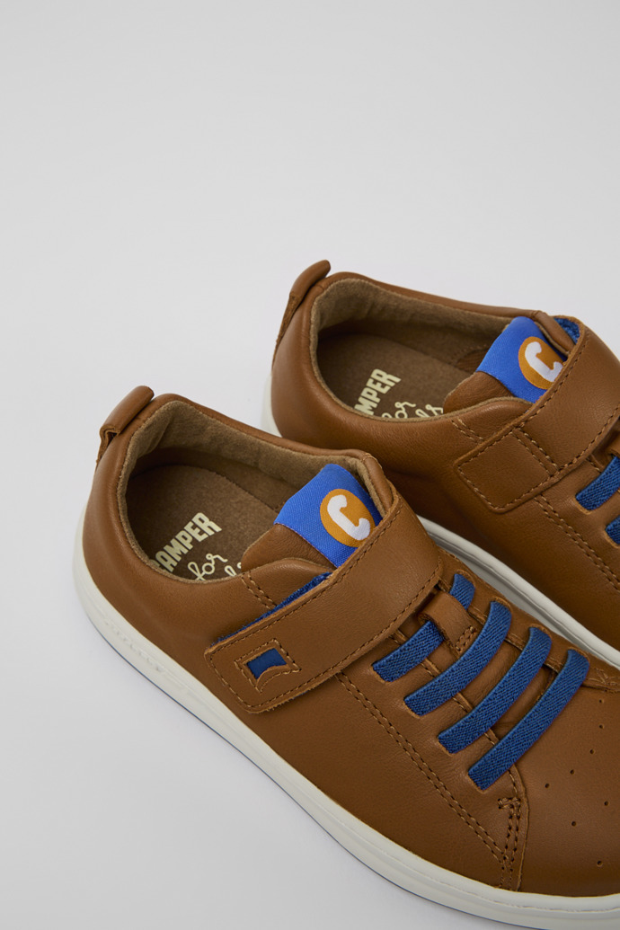 Close-up view of Runner Brown leather sneakers for kids