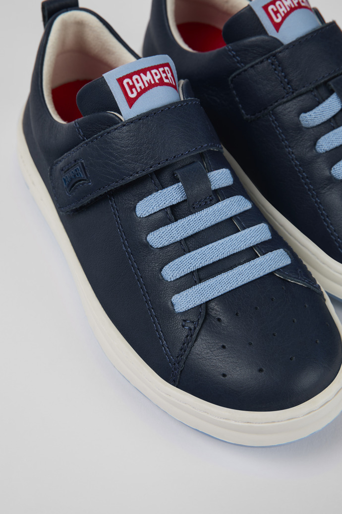 Close-up view of Runner Blue Leather Sneaker