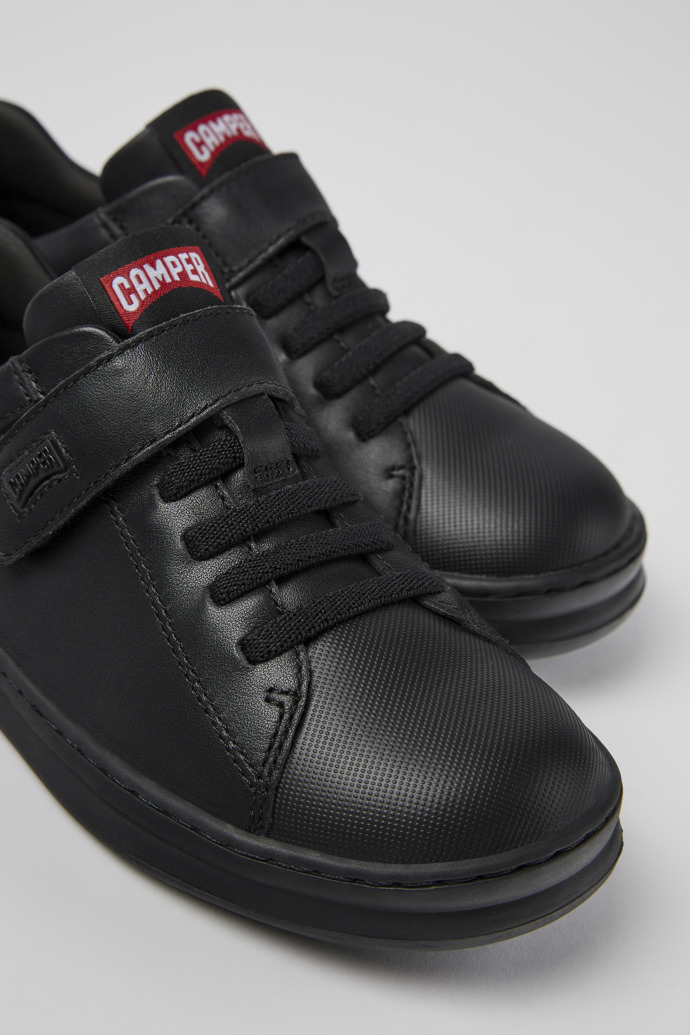 Close-up view of Runner Black leather and textile sneakers for kids