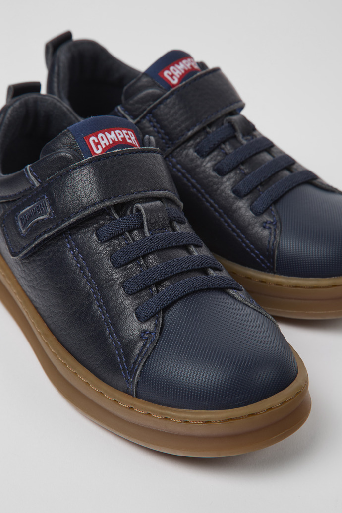 Close-up view of Runner Navy blue leather and textile sneakers for kids