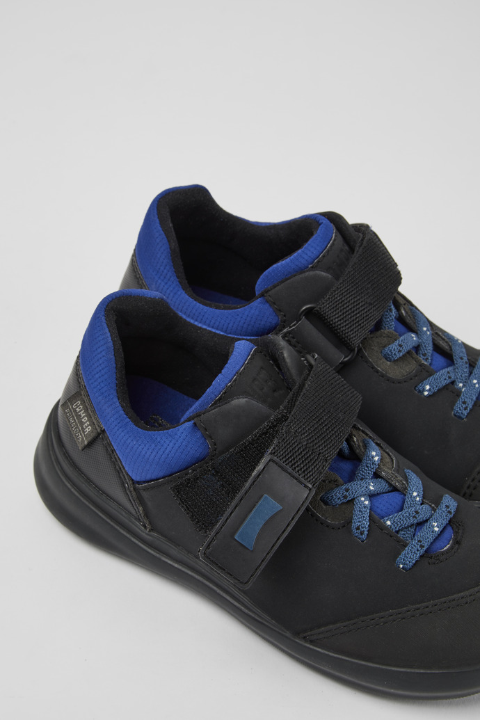 Close-up view of Ergo Black textile sneakers