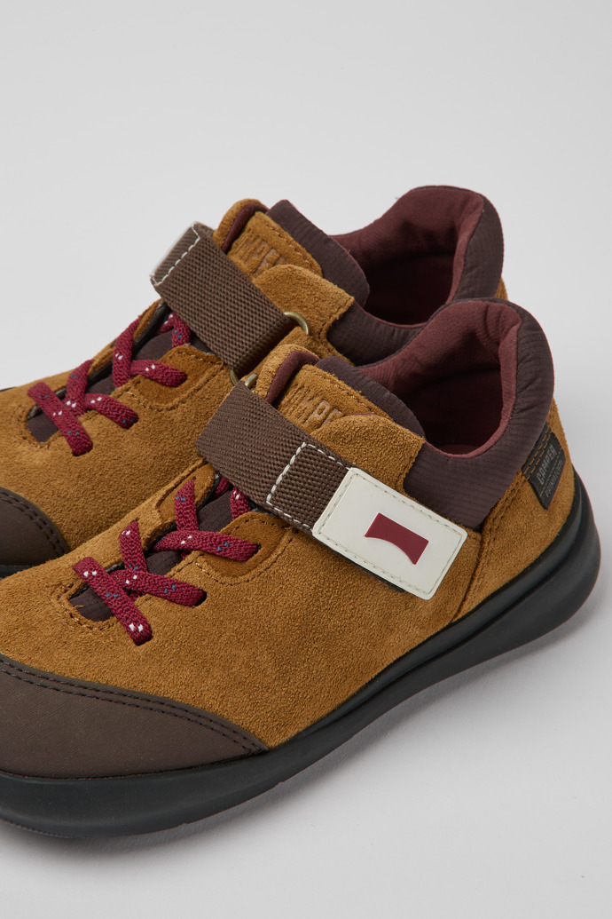 Close-up view of Ergo Brown textile and nubuck sneakers