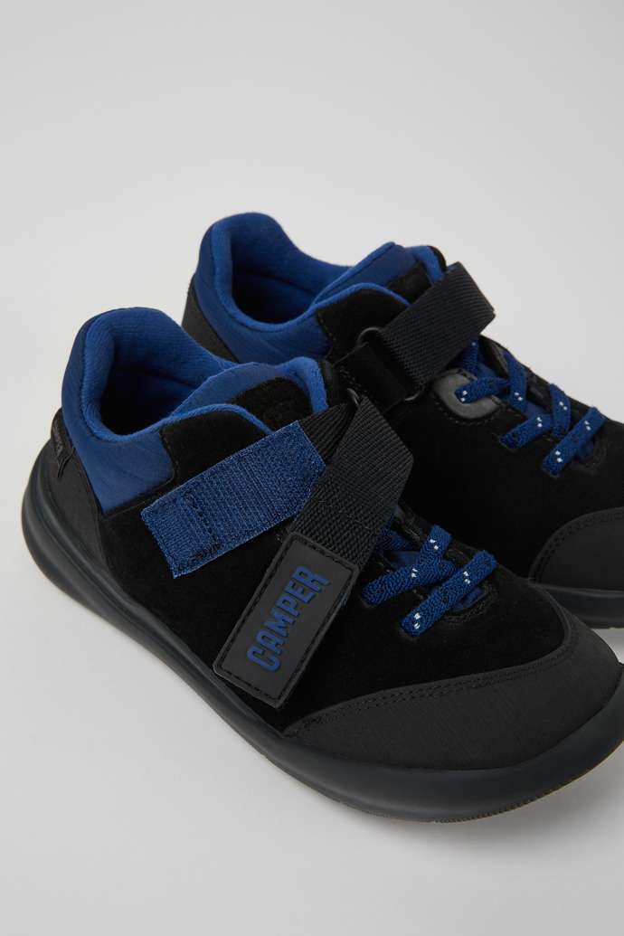 Close-up view of Ergo Black, blue, and grey nubuck and textile shoes