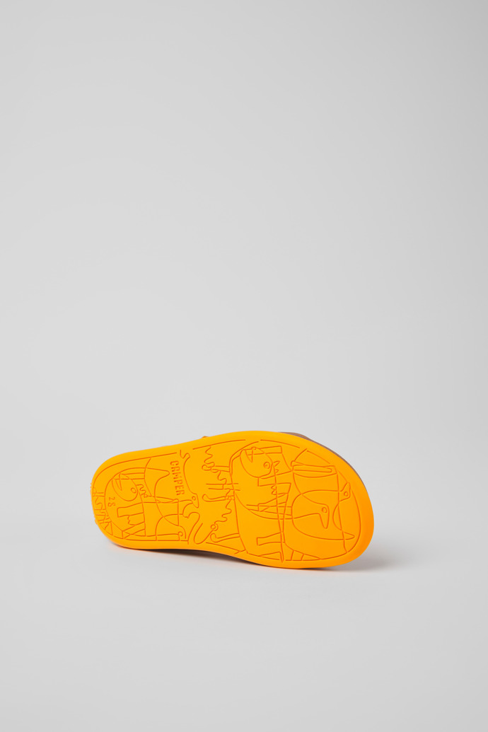 The soles of Bicho Orange leather sandals for kids