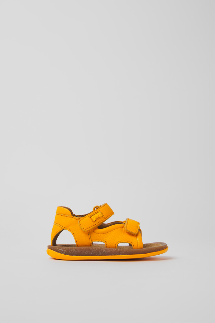 Side view of Bicho Yellow leather sandals for kids