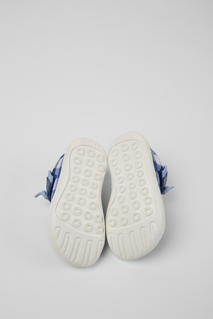 The soles of Peu Blue and white shoes for kids