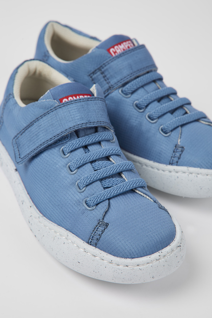 Close-up view of Peu Touring Blue textile shoes for kids