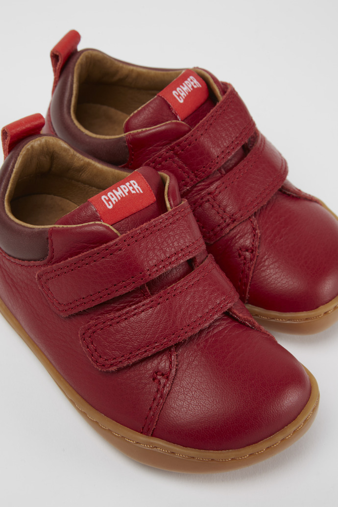 Close-up view of Peu Red leather sneakers
