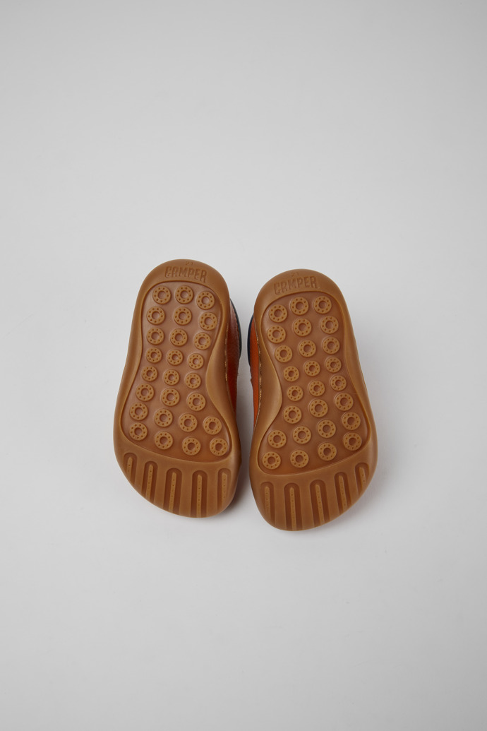 The soles of Peu Orange sneakers