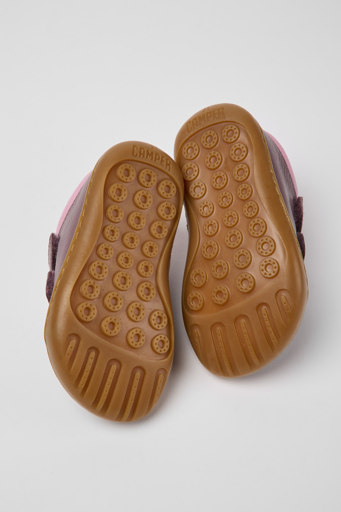 The soles of Peu Violet leather sneakers