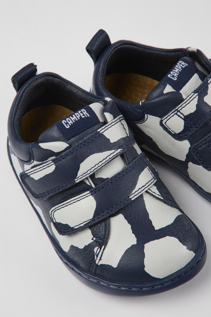 Close-up view of Twins Blue and white leather shoes for kids