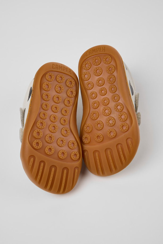 The soles of Twins White Leather Sneakers for kids.