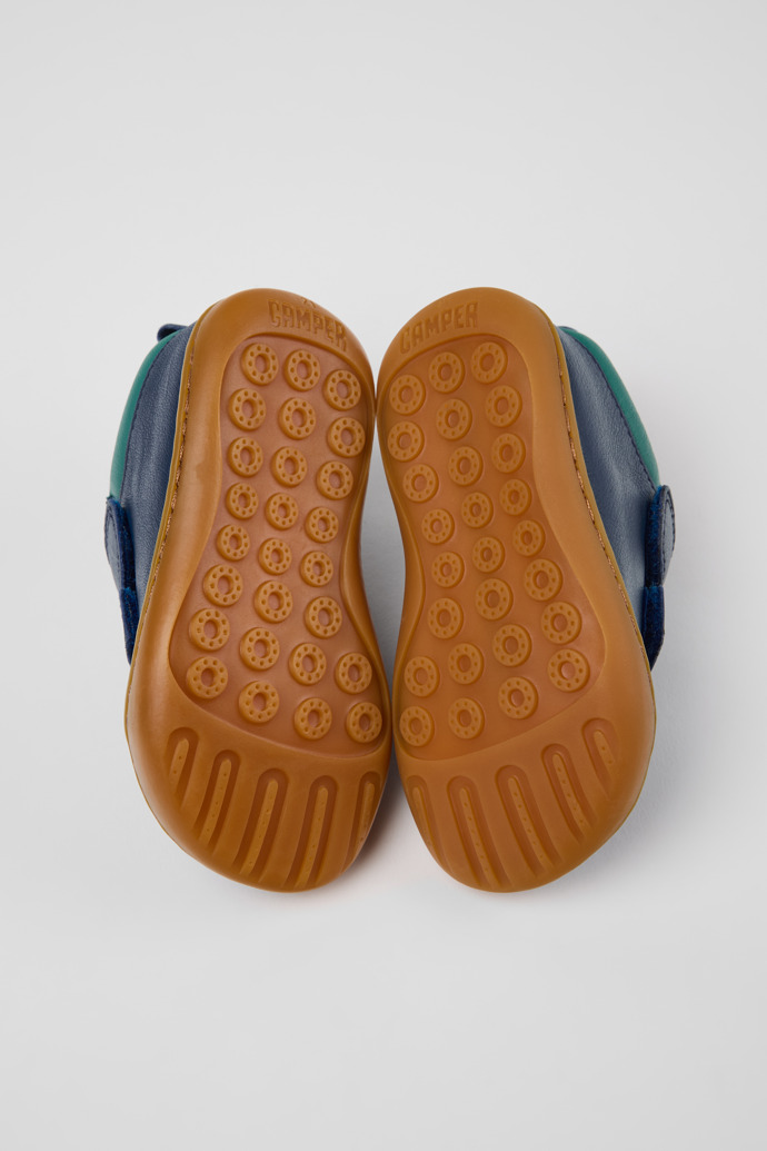 The soles of Peu Blue and Green Leather Sneakers for kids.