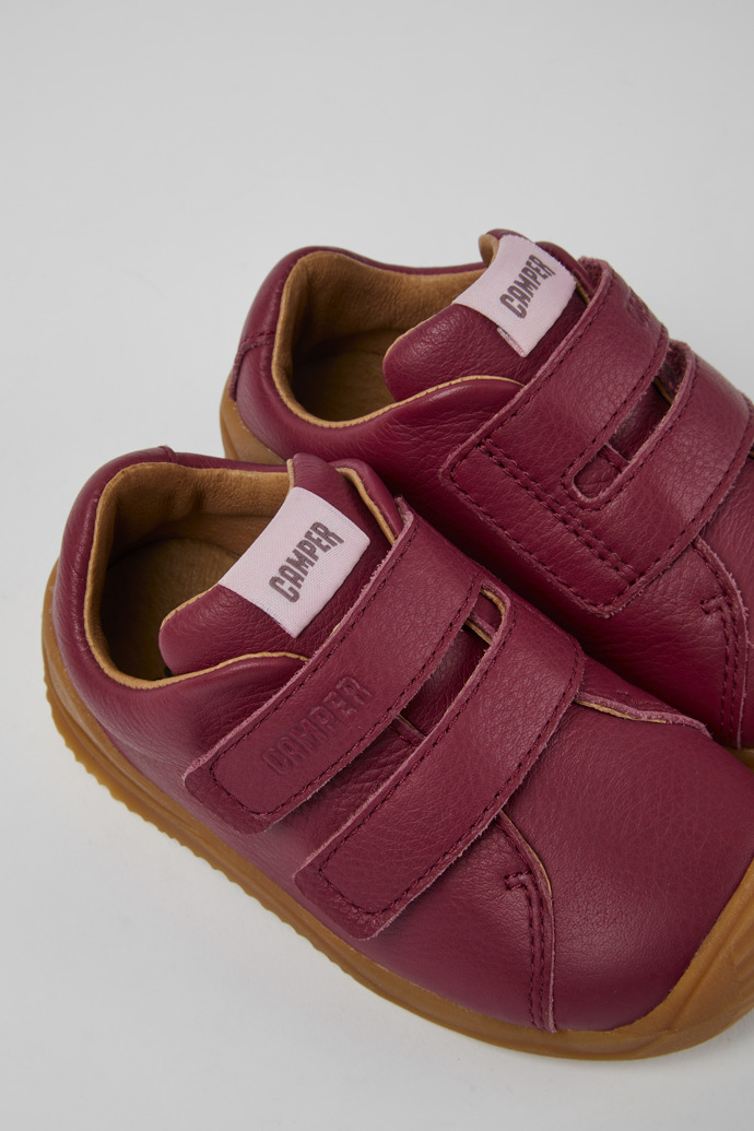 Close-up view of Dadda Pink leather sneakers