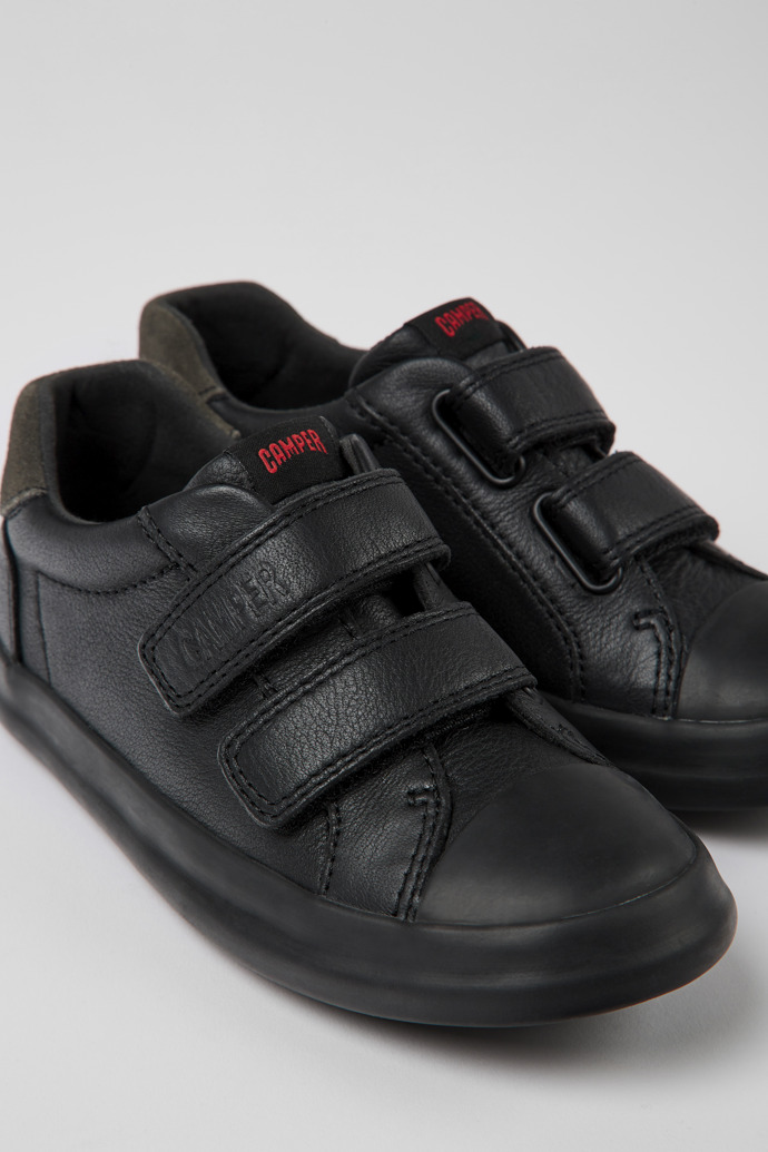 Close-up view of Pursuit Black leather and nubuck sneakers for kids