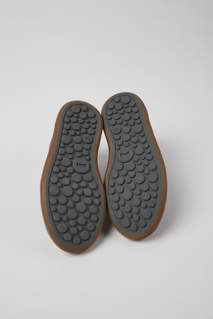 The soles of Pursuit Blue leather and nubuck sneakers for kids