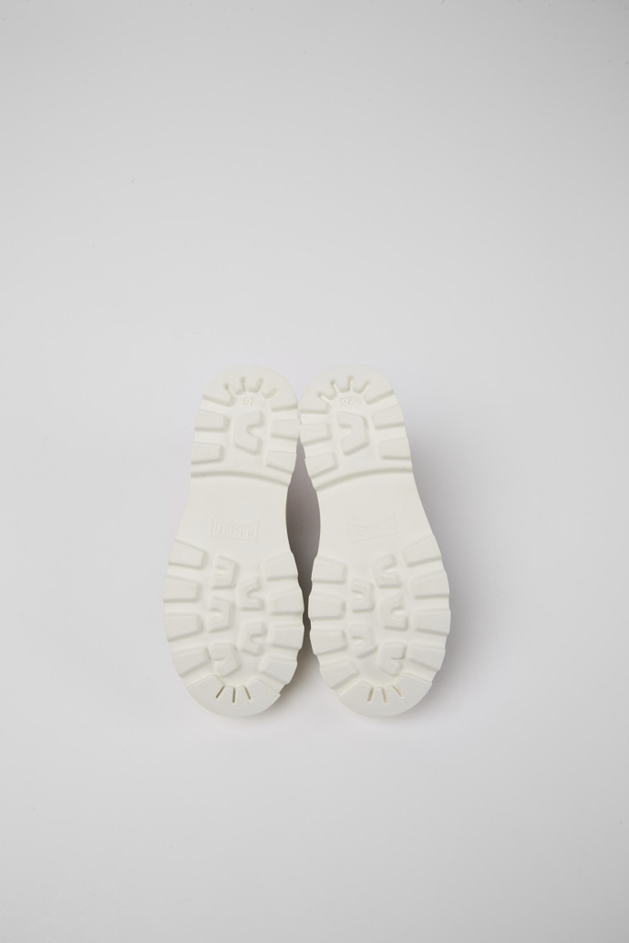 The soles of Brutus Burgundy organic cotton shoes for kids