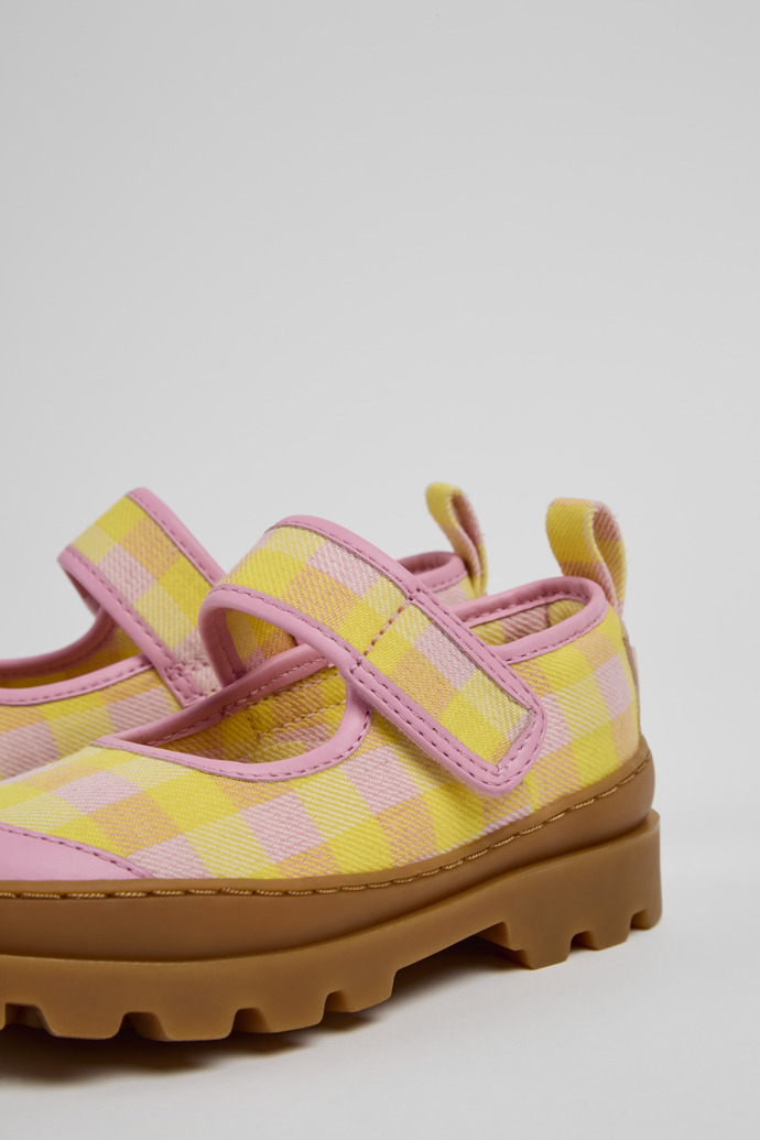 Close-up view of Brutus Pink and yellow Mary Jane shoes for kids