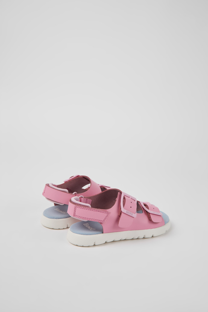 Back view of Oruga Pink leather sandals for kids