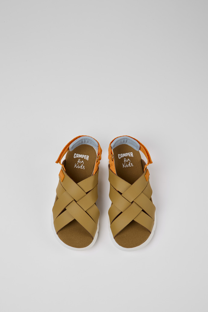 Overhead view of Oruga Brown leather sandals for kids