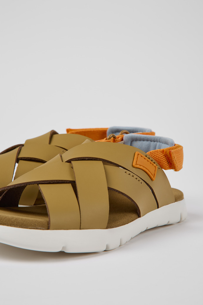 Close-up view of Oruga Brown leather sandals for kids