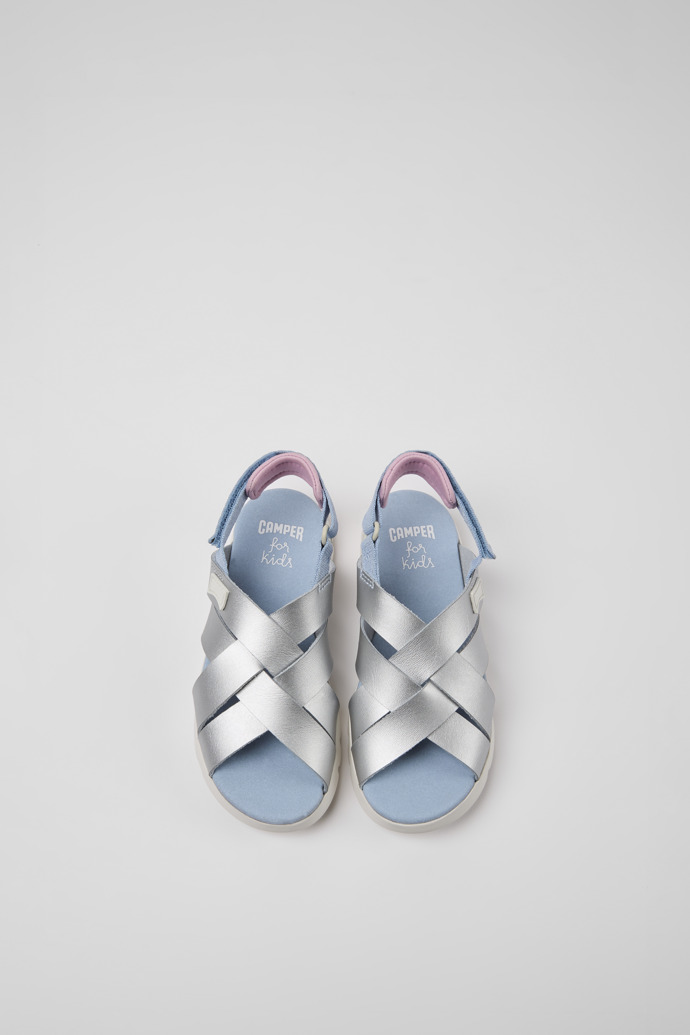 Overhead view of Oruga Silver leather sandals for kids