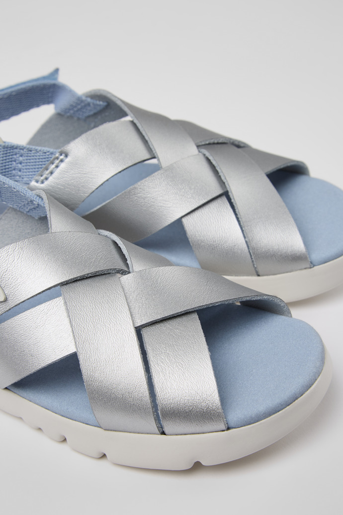 Close-up view of Oruga Silver leather sandals for kids