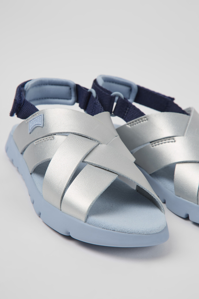 Close-up view of Oruga Grey leather and textile sandals for kids