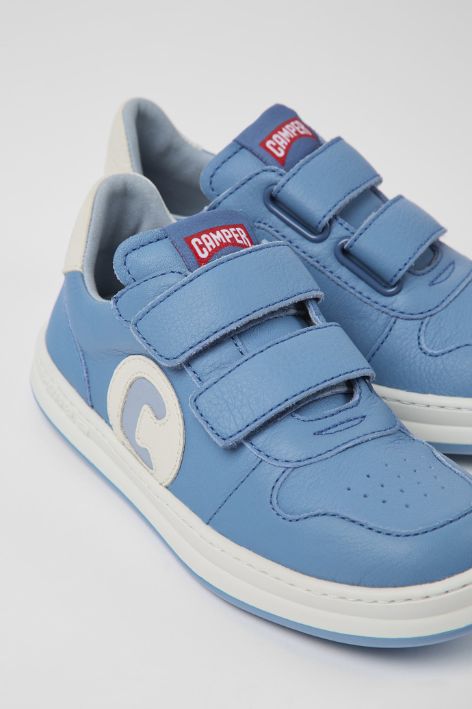 Close-up view of Runner Blue leather sneakers for kids