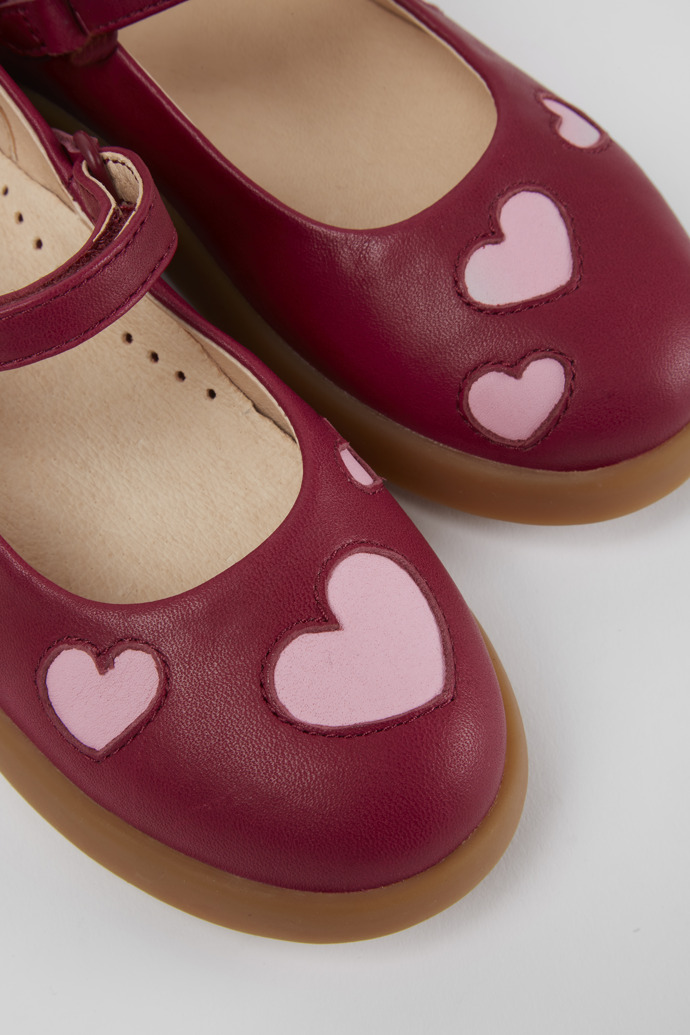 Close-up view of Twins Pink leather shoes