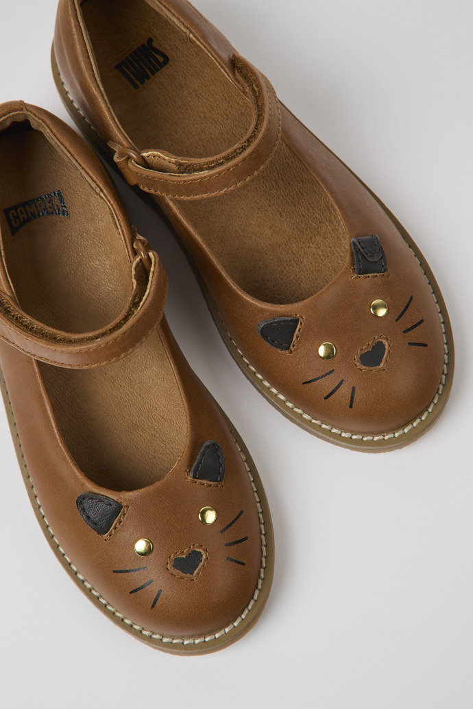 Close-up view of Twins Brown leather Mary Jane flats