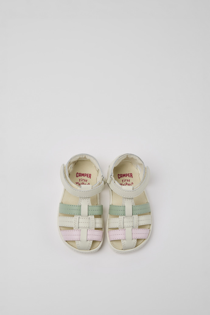 Overhead view of Miko White, green, and pink leather sandals