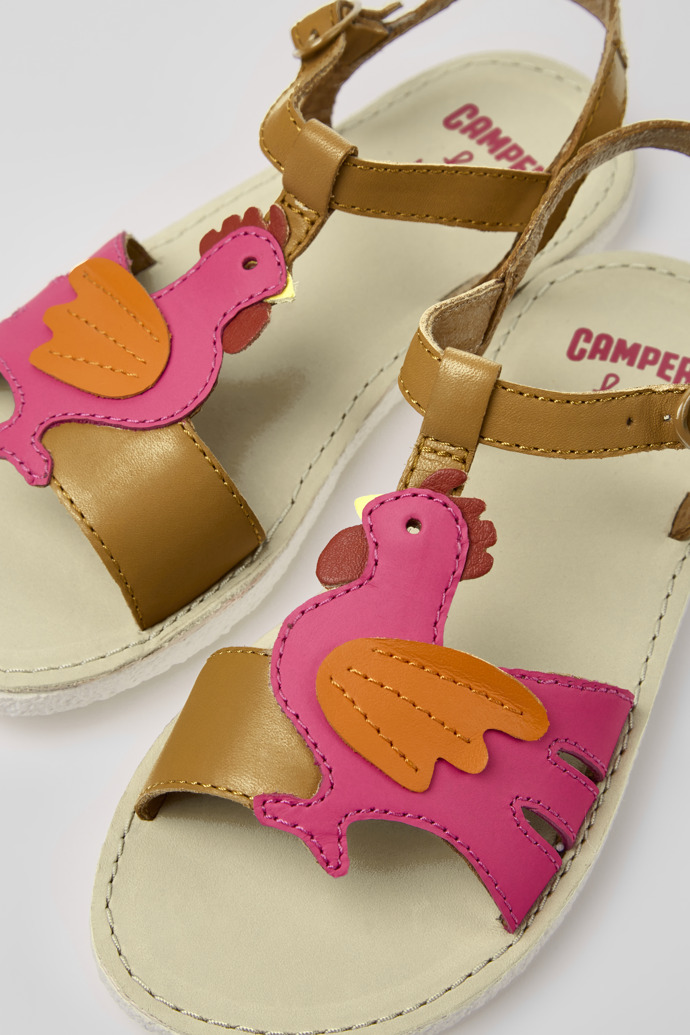 Close-up view of Miko Brown and pink leather sandals for girls