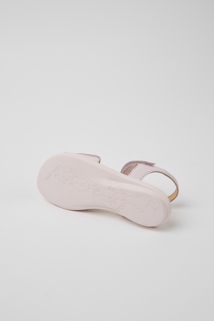 The soles of Twins Pink leather sandals for girls