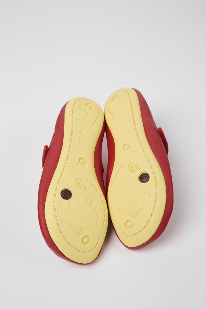 The soles of Twins Red leather ballerinas for kids