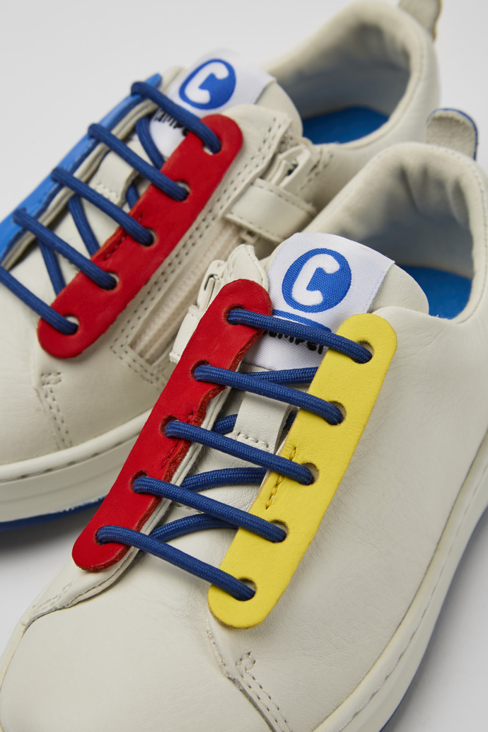 Close-up view of Twins White leather sneakers for kids