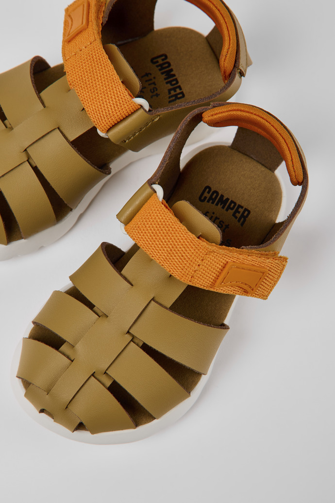 Close-up view of Oruga Brown leather sandals