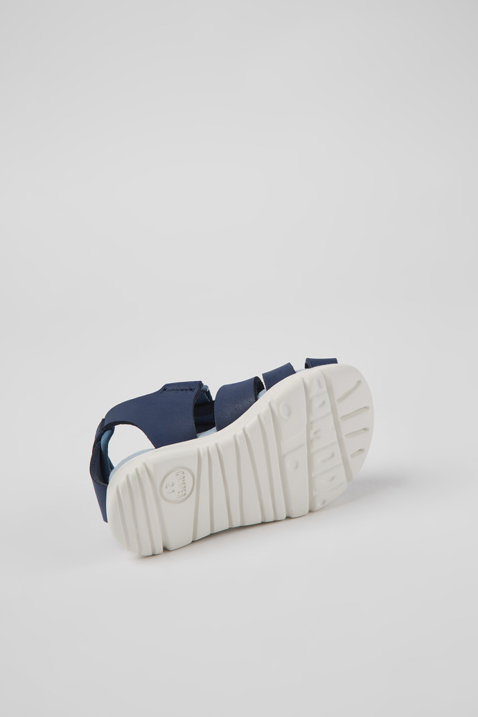 The soles of Oruga Blue leather and textile sandals for kids