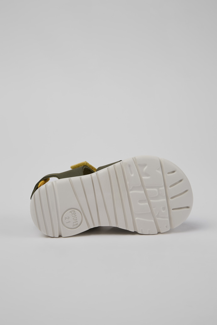 The soles of Oruga Green leather and textile sandals for kids