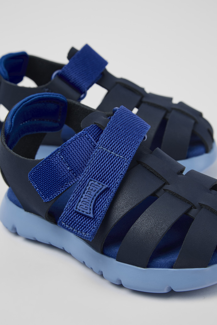 Close-up view of Oruga Blue Leather/Textile Sandal
