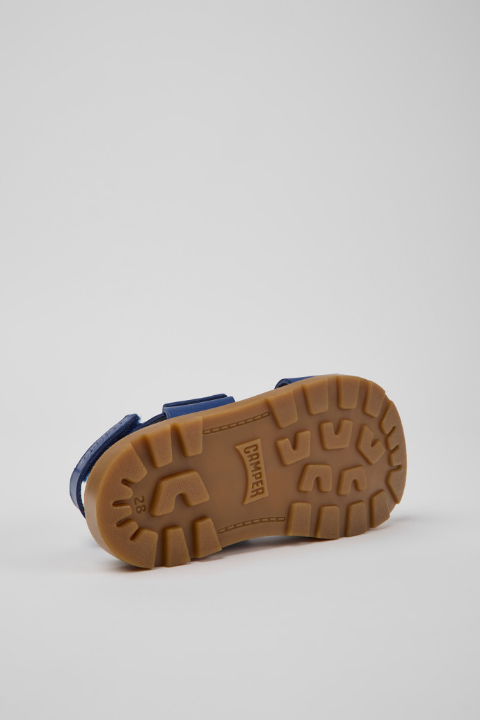The soles of Brutus Sandal Blue leather sandals for kids