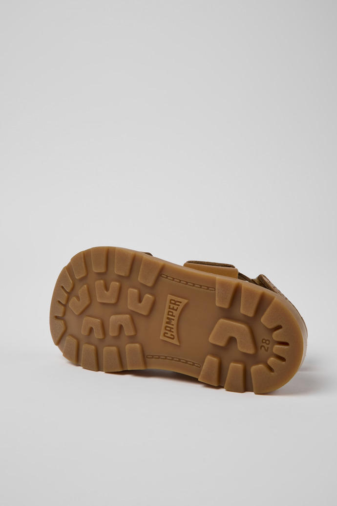 The soles of Brutus Sandal Brown leather sandals for kids