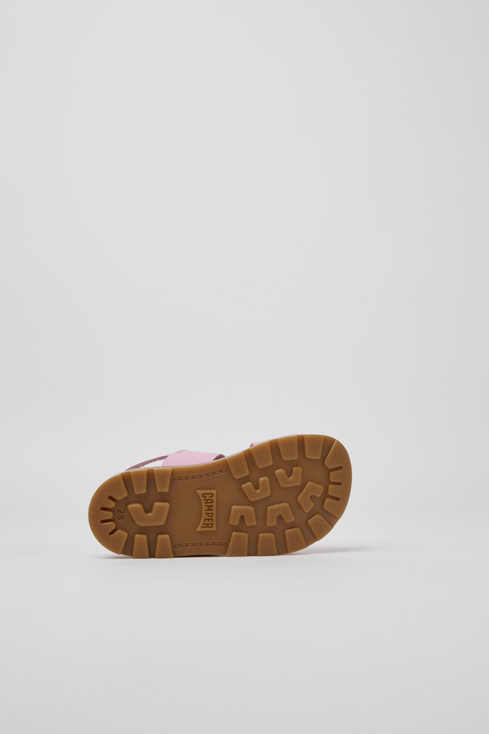 The soles of Brutus Sandal Pink leather sandals for girls