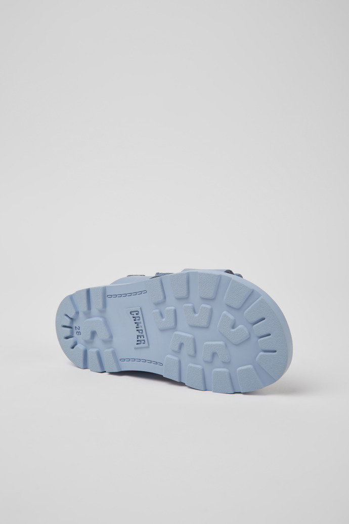 The soles of Brutus Sandal Light blue leather sandals for girls